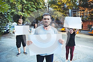 Group of protesting young people outdoors