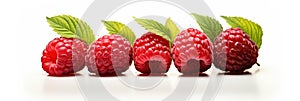 A Group Of Raspberries With Leaves On A White Background