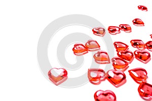 A group of red hearts on a white background with copy space. Valentine`s day theme.