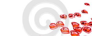 A group of red hearts on a white background with copy space. Valentine`s day theme.