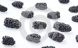 Group of ripe blackberry on a white background