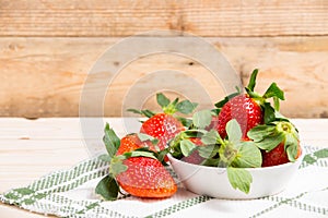 Group ripe red strawberry on wooden table