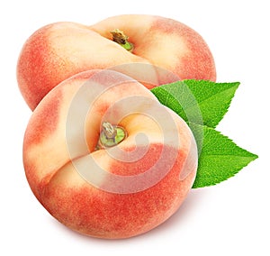 Group of ripe sweet donut peaches with leaves isolated on white background.