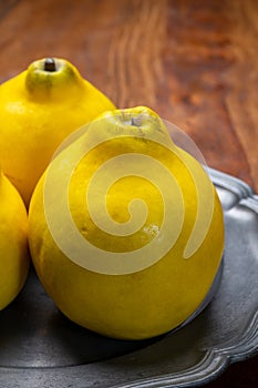 Group of ripe yellow quince apples