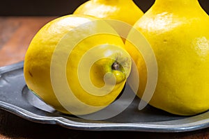 Group of ripe yellow quince apples