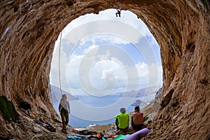 Group of rock climbers in cave