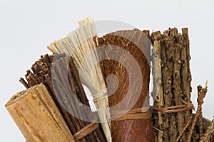 A group of rolled wooden decorative items