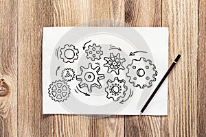 Group of rotating gears pencil hand drawn