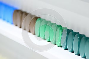 The group of row multi-color plastic bottle caps