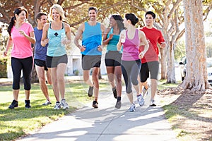 Group Of Runners On Suburban Street