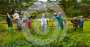 Group of Scarecrows on a fence in a Garden on Island of Iona,Argyll & Bute,scotland,UK