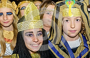 Group of school children wearing egyptian costumes for maskenball