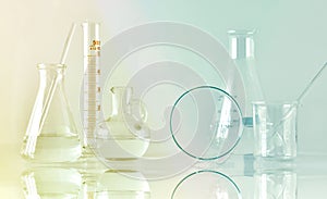 Group of scientific laboratory glassware with clear liquid solution, Research and development