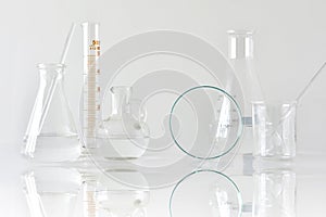 Group of scientific laboratory glassware with clear liquid solution, Research and development