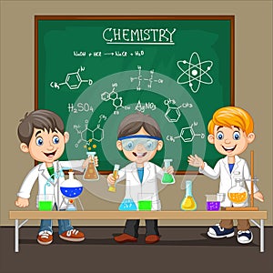 Group of scientist boy doing chemical experiment