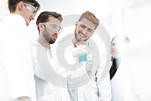 Group of scientists working with chemicals