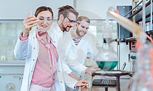 Group of scientists working in the laboratory