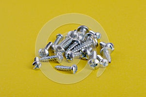 Group of screw on the green background