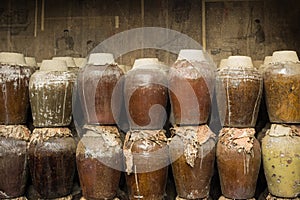 A group of sealed ceramic beer barrel, stored in a beer factory in Zhouzhuang Water Town, China.