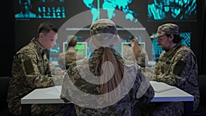 Group of security squad in control center. Military headquarters surveillance officers cyber police briefing at the