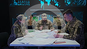 Group of security squad in control center. Military headquarters surveillance officers cyber police briefing at the