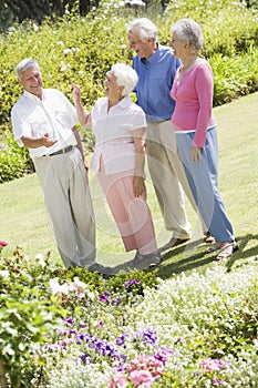 Group of senior friends in garden