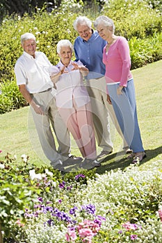 Group of senior friends in garden