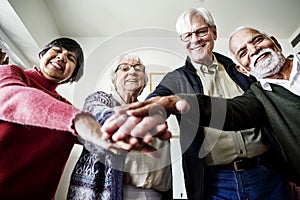 Group of senior friends support concept