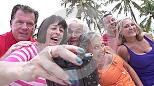 Group Of Senior Friends Taking Selfie On Bicycle Ride