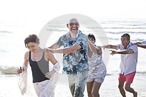 Group of seniors on the beach