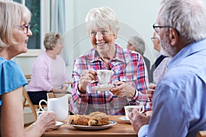 Group Of Seniors Meeting At Social Club