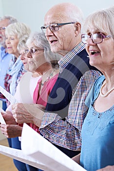 Group Of Seniors Singing In Choir Together