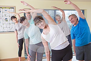 Group of seniors stretching photo