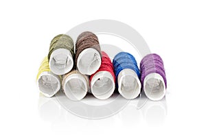 Sewing thread spool isolated on white