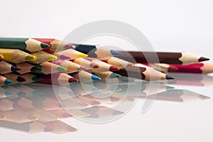 Group of sharp colored pencils with white background