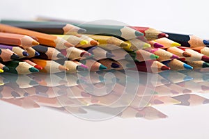 Group of sharp colored pencils with white background
