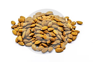 A group of shelled almonds on a white background. Perfect shot for vegan living, health and wellness