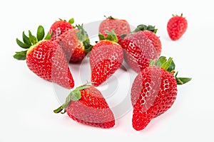 A group of shiny ripe strawberries