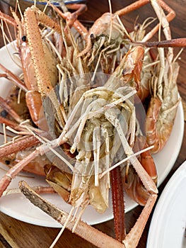 Group shrimp grilled on white digh