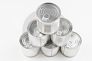 Group of silver canned food on white background