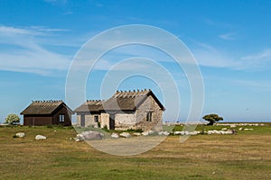 Group of traditional, rural houses on the island of Ãâland, Sweden photo