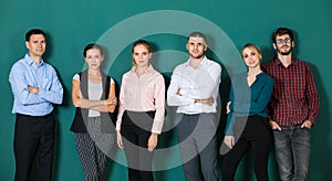 Group of six businesspeople colleague in modern company standing together. The idea for team work in a business office