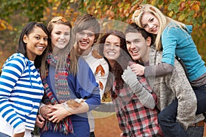 Group Of Six Teenage Friends Having Fun