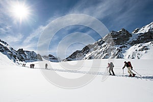 Group of ski mountaineers during a trip on the alps