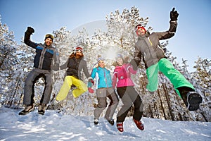 Group of skiers in jump