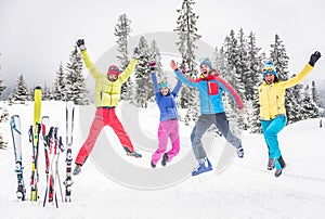 Group of skiers jumping on the snow