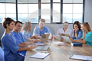 Group of smart medical students with gadgets