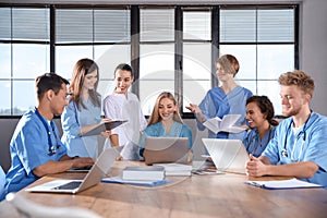 Group of smart medical students with gadgets