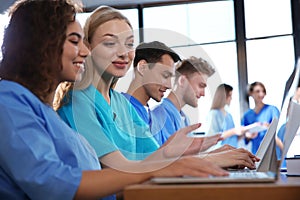 Group of smart medical students with gadgets