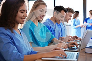 Group of smart medical students with gadgets